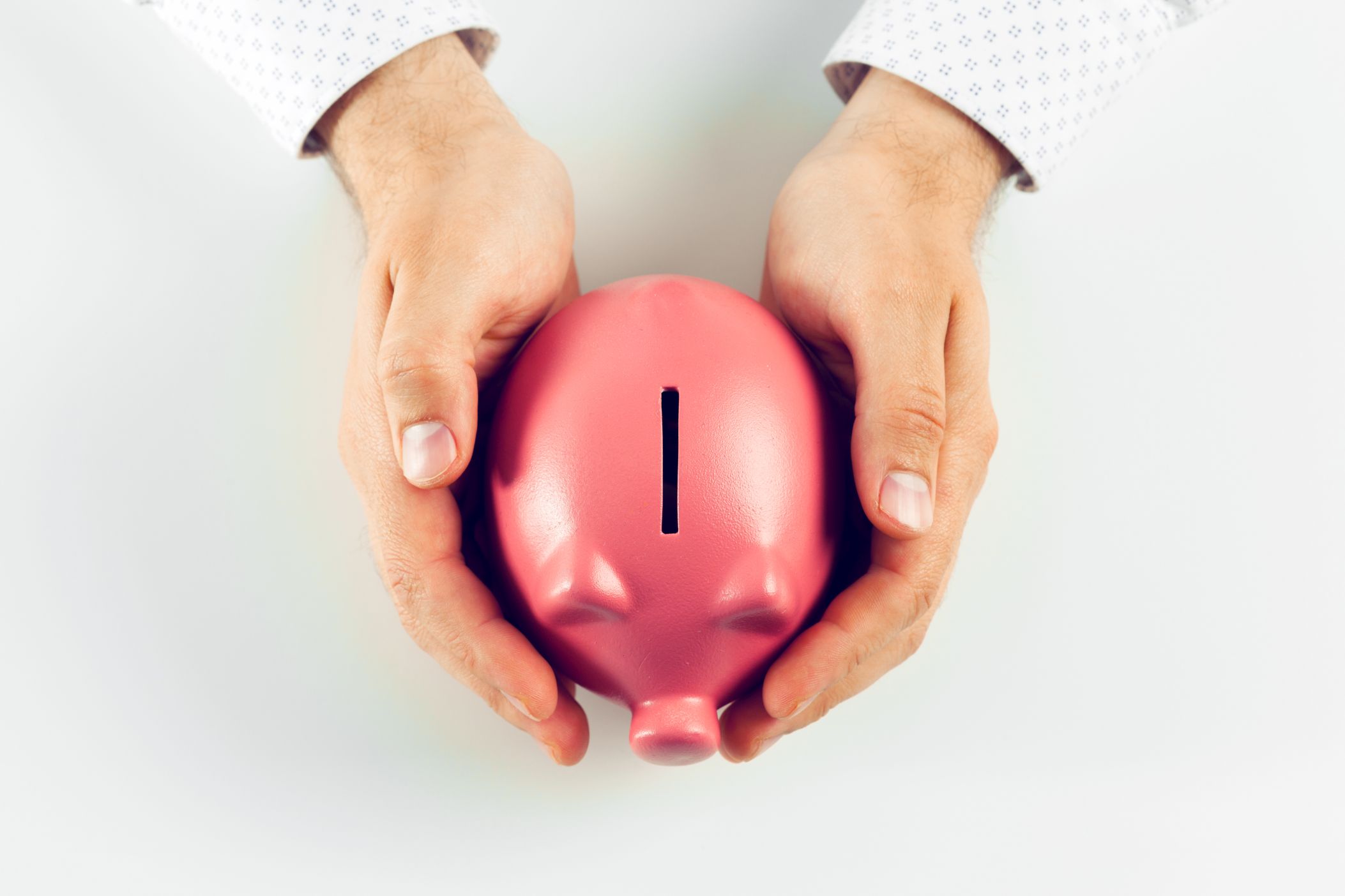 man holding piggy bank . top view
