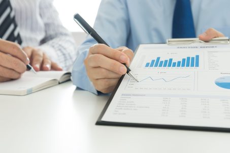 Businessmen are analyzing market data to clients or partners have been informed. Concepts of business analysis,business meeting,business team.