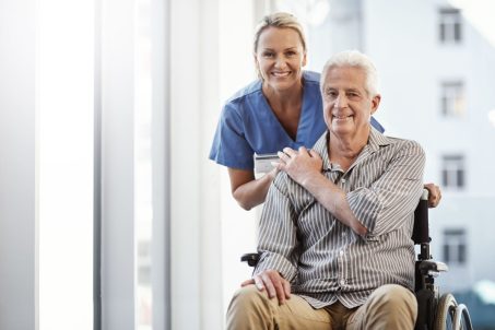 She is the best. Cropped portrait of a mature female nurse and her senior male wheelchair-bound patient in the hospital